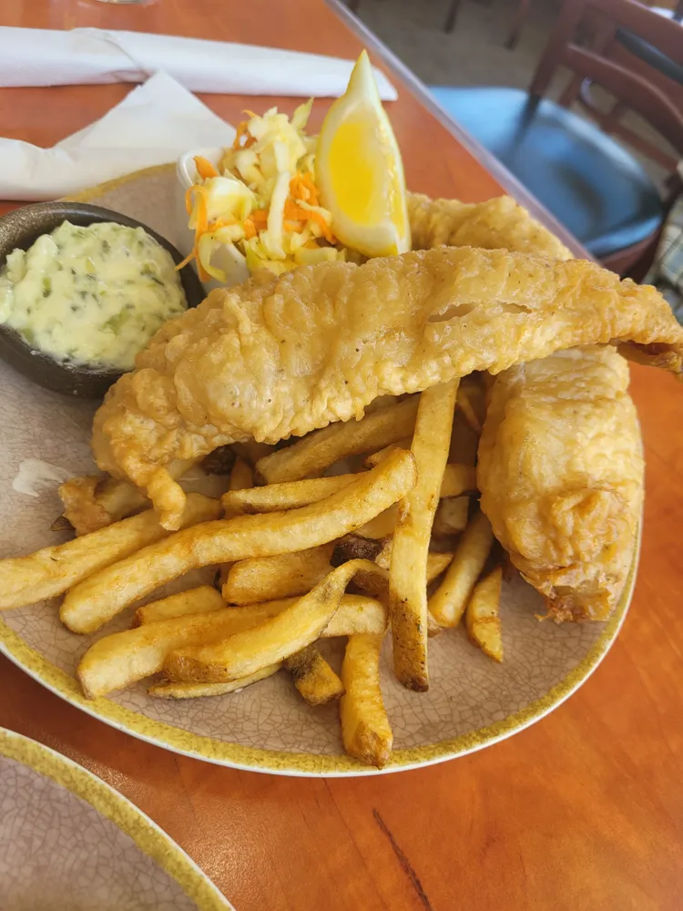 Battered haddock with fries, coleslaw and tartar sauce